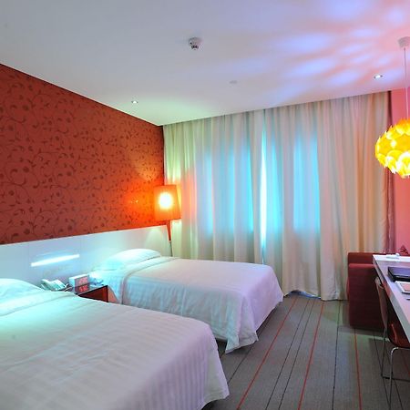 Otique Aqua Hotel Shenzhen Exteriör bild